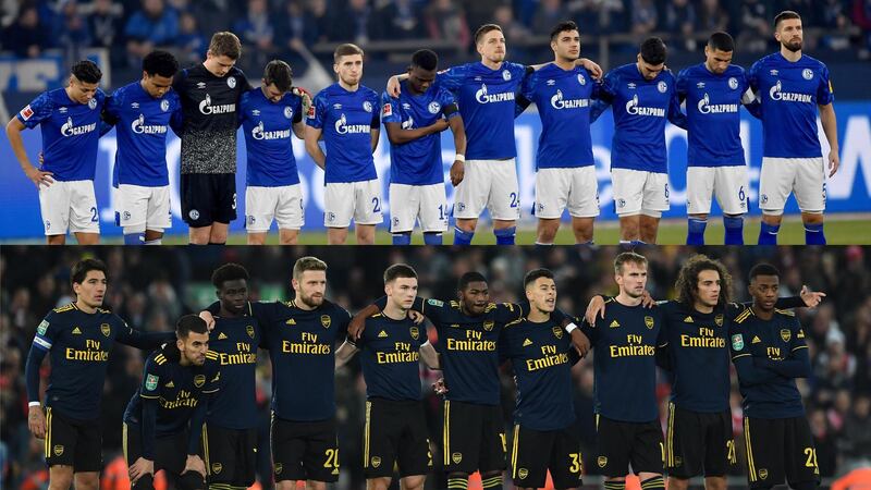 GELSENKIRCHEN, GERMANY - FEBRUARY 22: Players of Schalke line up for a minute of silence in remembrance for the victims of the Hanau Shootings prior to  the Bundesliga match between FC Schalke 04 and RB Leipzig at Veltins-Arena on February 22, 2020 in Gelsenkirchen, Germany. (Photo by Frederic Scheidemann/Bongarts/Getty Images)

LIVERPOOL, ENGLAND - OCTOBER 30: The Arsenal players line up for the penalty during the Carabao Cup Round of 16 match between Liverpool and Arsenal at Anfield on October 30, 2019 in Liverpool, England. (Photo by David Price/Arsenal FC via Getty Images)