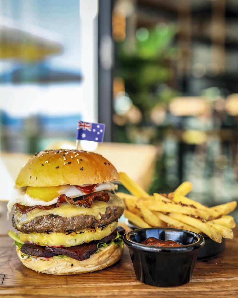 A True Blue Aussie burger is available at Jones the Grocer outlets across the UAE for a limited period. Courtesy Jones the Grocer