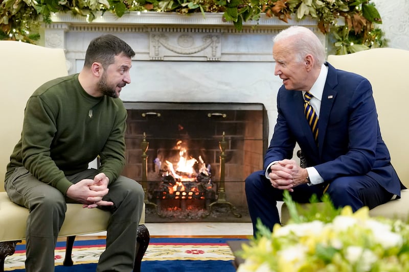 Joe Biden speaks to Mr Zelenskyy in the Oval Office of the White House, Washington DC, in December 2022. AP