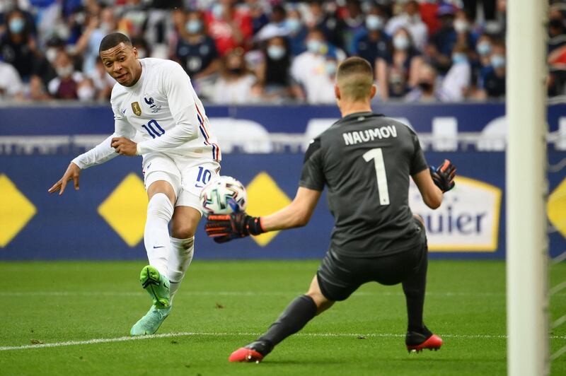 France's forward Kylian Mbappe shoots on goal during the friendly football match France vs Bulgaria ahead of the Euro 2020 tournament, at Stade De France in Saint-Denis, on the outskirts of Paris on June 8, 2021. (Photo by FRANCK FIFE / AFP)