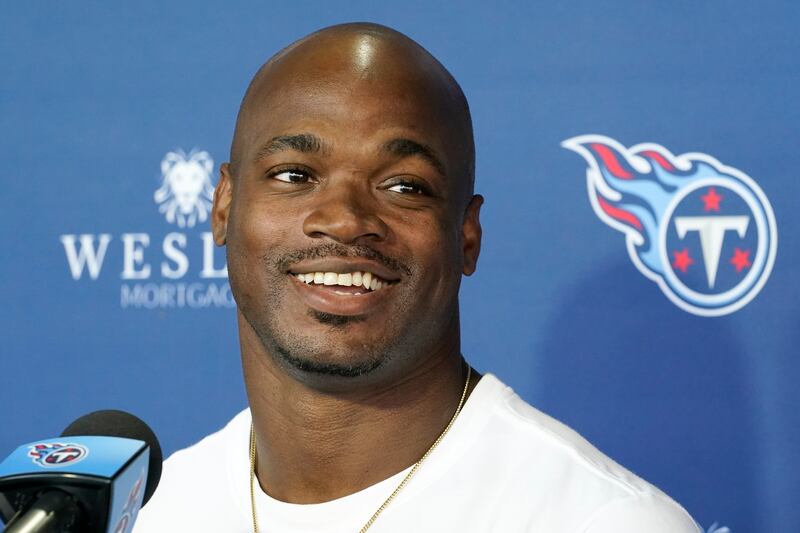 Tennessee Titans running back Adrian Peterson joins Reese Witherspoon as part of owner of the Nashville FC. AP