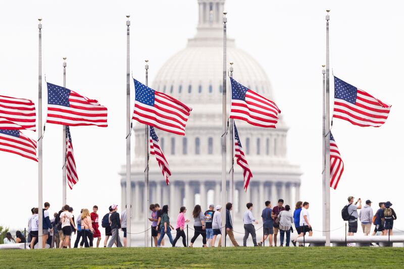 American flags fly at half-staff to mark one million deaths from the coronavirus on the National Mall in Washington. EPA