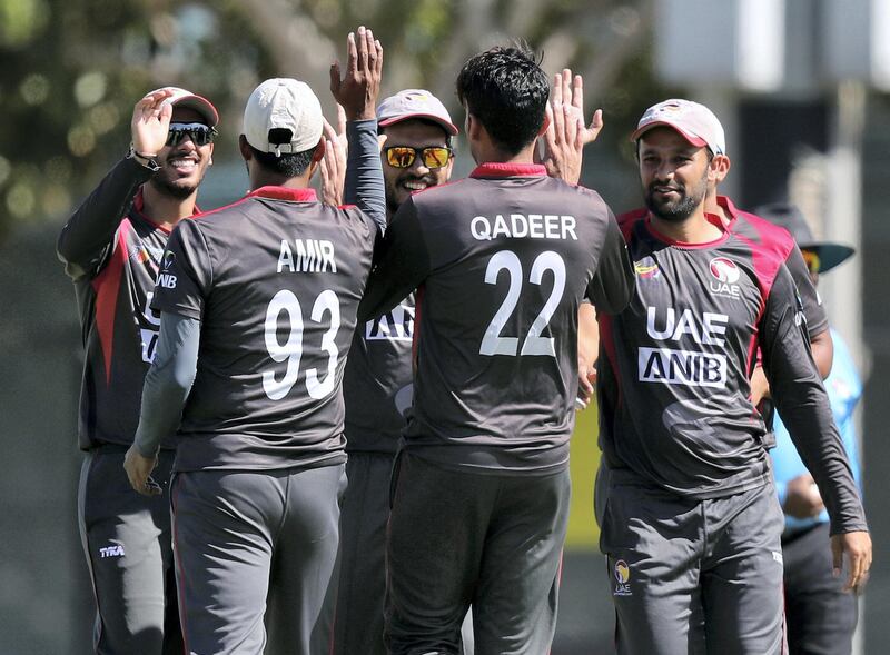 Dubai, United Arab Emirates - March 20, 2019: UAE's Qadeer Ahmed takes the wicket of Surrey's Scott Borthwick during the game between UAE and Surrey. Wednesday the 20th of March 2019 ICC cricket academy, Dubai. Chris Whiteoak / The National