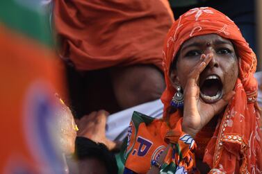 An Indian woman supporting the Bharatiya Janata Party (BJP) shouts slogans during the final day of election campaigning in the city of Pathanamthitta, in the south Indian state of Kerala. AFP