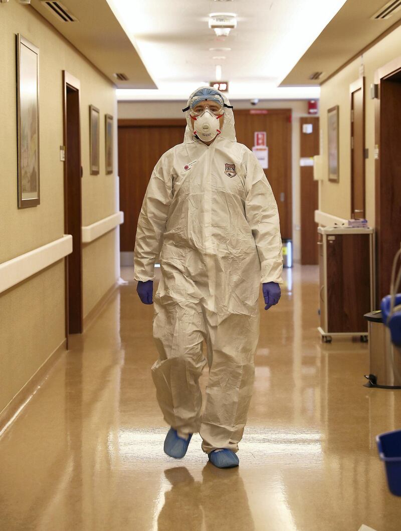 DUBAI, UNITED ARAB EMIRATES , April 26– 2020 :- Dr. Adel Alsisi, Consultant Critical Care Medicine, Chief Medical Officer, Prime Hospital wearing PPE kit at the COVID-19 ward at the Prime Hospital on airport road in Al Garhoud in Dubai . (Pawan Singh / The National) For News/Standalone/Online/Instagram/Stock.  Story by Nick Webster
