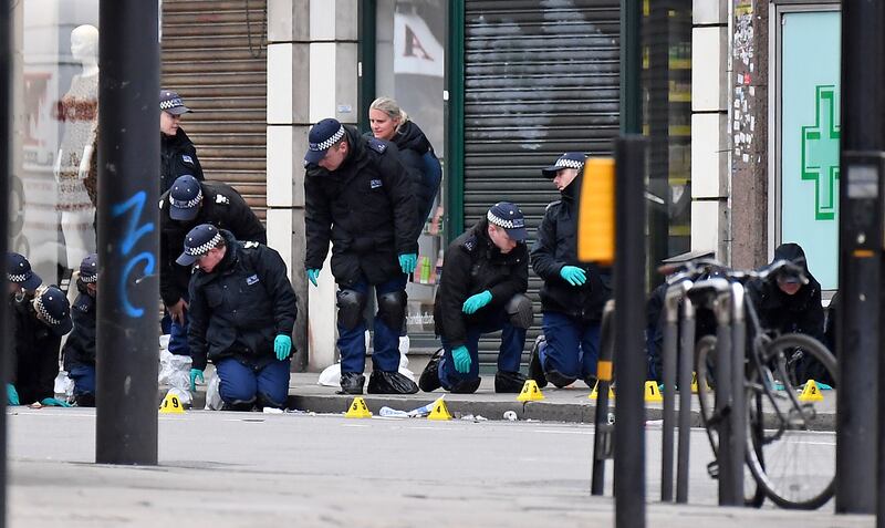 Police officers working at the scene of the attack in Streatham in February 2020. AP Photo