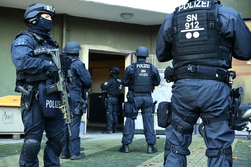 Police officers during a raid in Berlin linked to the  Green Vault burglary in Dresden, Germany. EPA