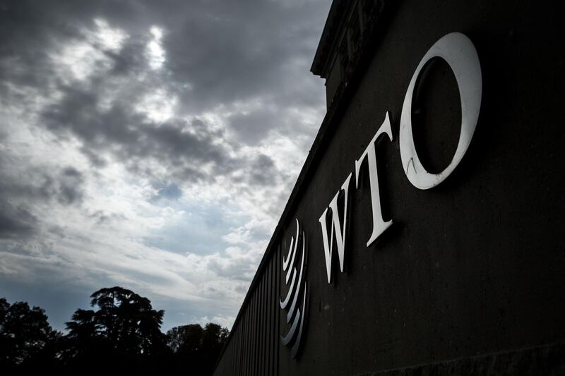 (FILES) In this file photo taken on September 21, 2018, a sign of the World Trade Organization (WTO) is seen at their headquarters in Geneva. The World Trade Organization on Thursday, April 18, 2019 largely sided with the United States in its Obama-era case against Beijing over Chinese restrictions on imports of American grain. The WTO decision was the second in as many months to favor Washington's position on trade with China in grain.  - 
 / AFP / Fabrice COFFRINI
