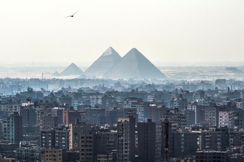 A picture taken on February 28, 2018 shows a view of the Pyramids of Giza on the southwestern outskirts of the Egyptian capital Cairo. (Photo by KHALED DESOUKI / AFP)