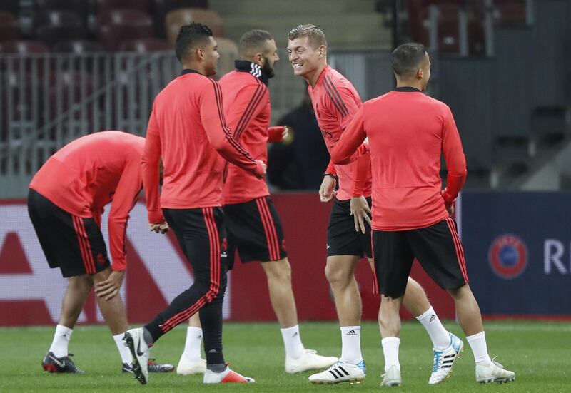 Kroos, centre, attends training session. EPA
