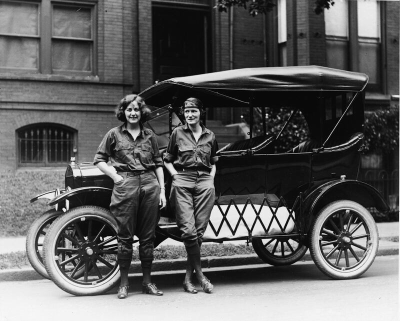Veterans Bureau employee Viola LaLonde and Census Bureau employee Elizabeth Van Tuyl pose beside a Ford automobile before making their cross-country drive from Washington, DC to San Francisco. (Photo by Hulton Archive/Getty Images) 