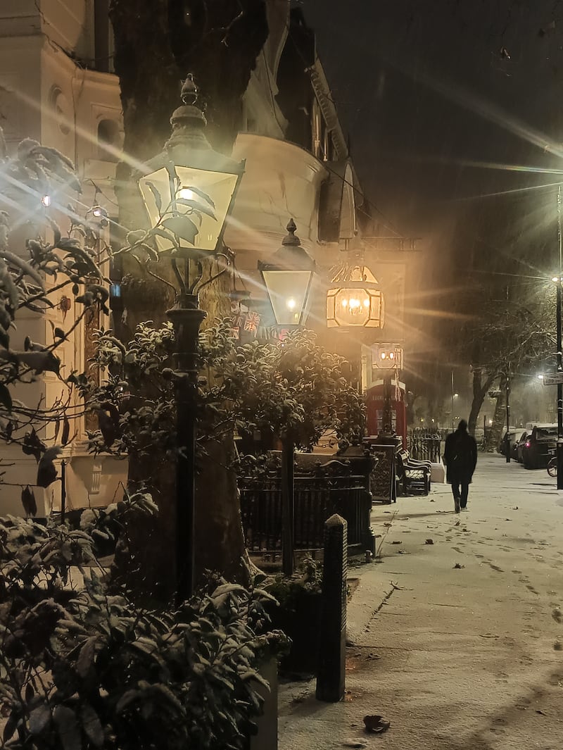 A wintry scene on a London street. PA