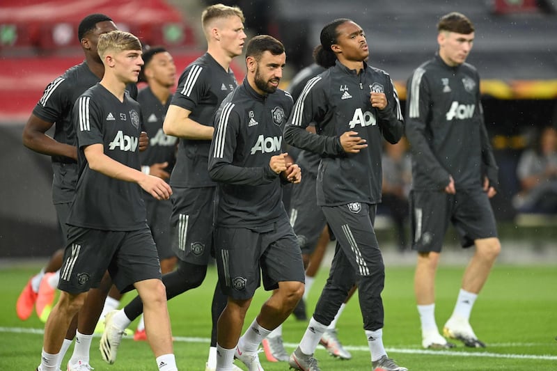 Manchester United's players take part in a training session ahead of the Europa League quarter-final match against FC Copenhagen in Cologne, Germany. AFP