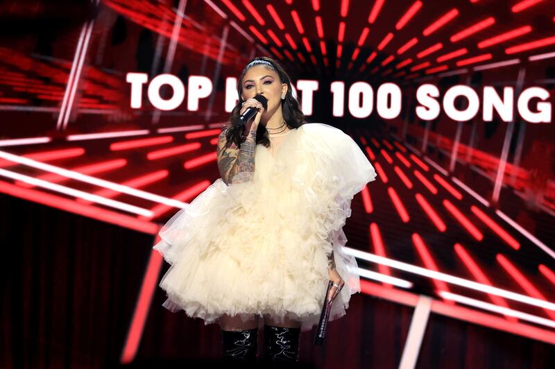 Julia Michaels wears a nude tulle dress by Gianvito Rossi for the Billboard Music Awards. Reuters