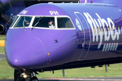 EXETER, ENGLAND - OCTOBER 18: A aircraft operated by the airline Flybe, taxis down the runway at Exeter Airport near Exeter on October 18, 2018 in Devon, England. The value of shares in the Exeter-based airline Flybe, have fallen dramatically recently after the company issued another profit warning, blaming poor demand, a weaker pound and higher fuel costs.(Photo by Matt Cardy/Getty Images)
