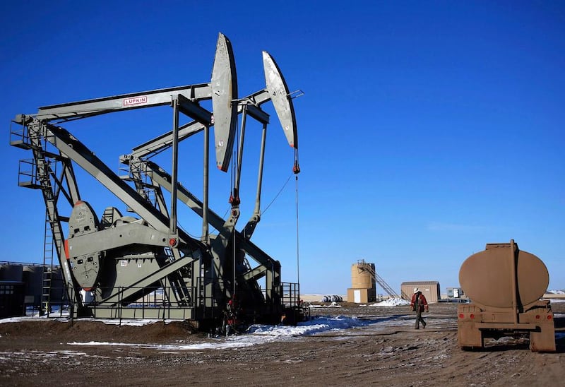Crude prices are wavering as the dollar stabilises amid an improving outlook in China. Reuters