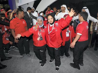 Abu Dhabi, United Arab Emirates - March 22nd, 2018: Members of the UAE team dance at the Closing Ceremony of the Special Olympics Regional Games. Thursday, March 22nd, 2018. ADNEC, Abu Dhabi. Chris Whiteoak / The National