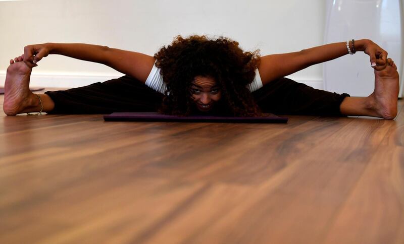 Yoga enthusiast Yasmin Machri practices at a studio in the western Saudi Arabian city of Jeddah on September 7, 2018. Yoga also works as therapy, the women said, helping them vent bottled up emotions and tackle depression. "It just opened me up like a water balloon," said Machri, 32. "After my first class... I started breaking down and crying."