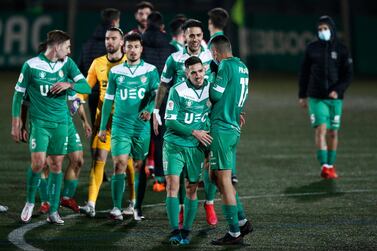 Ivan Guzman and Pablo Fernandez of Cornella celebrate their 1-0 victory over La Liga leaders Atletico Madrid. Getty Images