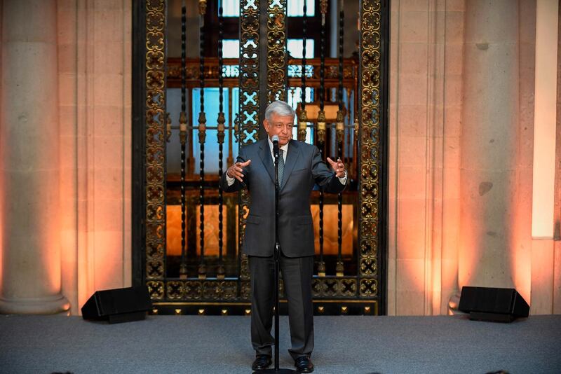 Mexican President-elect Andres Manuel Lopez Obrador speaks during a press conference at the National Palace in Mexico City after holding a meeting with President Enrique Pena Nieto, on July 3, 2018 Mexican president-elect Andres Manuel Lopez Obrador meets his outgoing predecessor, Enrique Pena Nieto, to begin preparing the transition he promises will bring "profound change" to the country. / AFP / ALFREDO ESTRELLA
