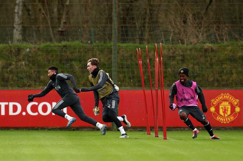 Jesse Lingard, James Garner and Angel Gomes of Manchester United during training. Getty Images