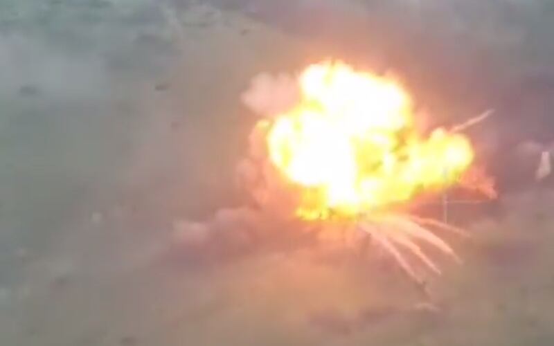 Drone footage shows the moment a Russian T-55 tank - reportedly packed with tonnes of high explosives - is detonated by remote-control near Ukrainian positions. Source: Telegram/@romanov_92