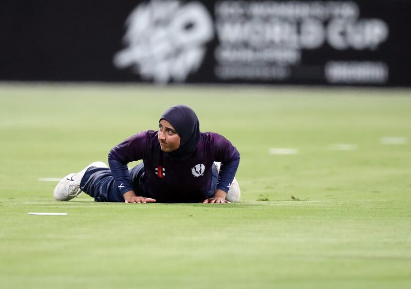 Scotland's Abtaha Maqsood watches the ball go for a boundary. 