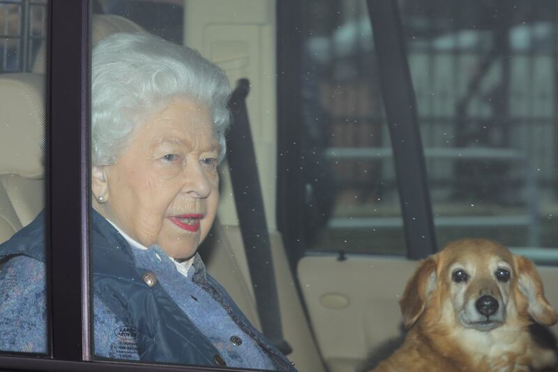 The queen leaving Buckingham Palace with her 'dorgi', a corgi-dachshund cross, called Candy in 2020. PA