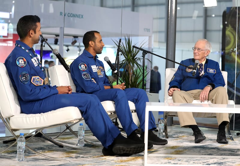 Apollo 16 astronaut Charles Duke in conversation with UAE astronauts Hazza Al Mansouri (M) and Sultan Al Neyadi on the second day of the Dubai airshow 2021. Chris Whiteoak/ The National