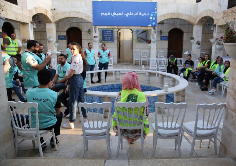 Volunteers of the Jordanian organization Tkiyet Um Ali (TUA) start to gather before taking part in the service for Meydet Ramadan Iftar, in Amman, Jordan. EPA