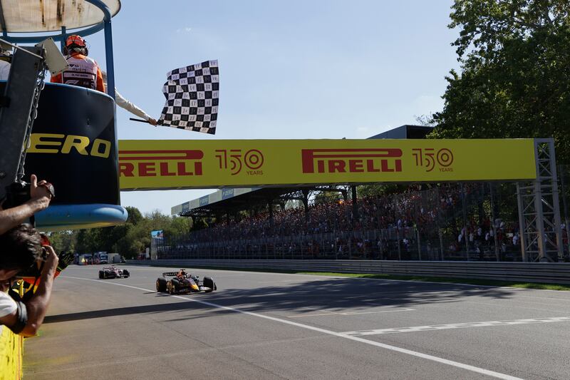 Max Verstappen crosses the finish line in Monza. AP