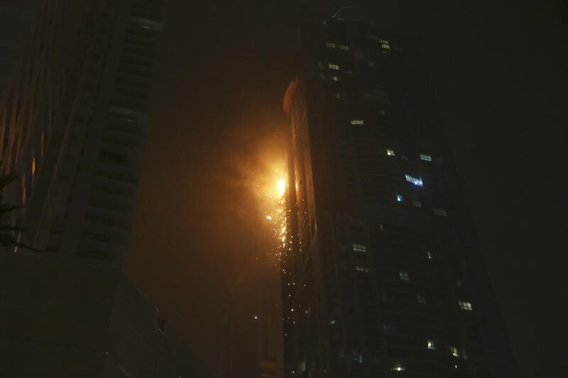 The Dubai Civil Defence said the situation is now under control and fire experts at Dubai Police will determine the cause of the blaze. Sarah Dea / The National