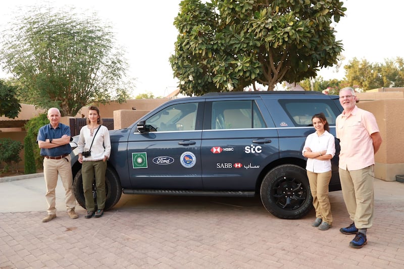 The Heart of Arabia team - Mark Evans MBE, Ana-Maria Pavalache, Reem Philby, and Alan Morrissey - with one of the two support cars they will be taking  on the expedition. Photo: Osama Farhan / British Embassy Riyadh