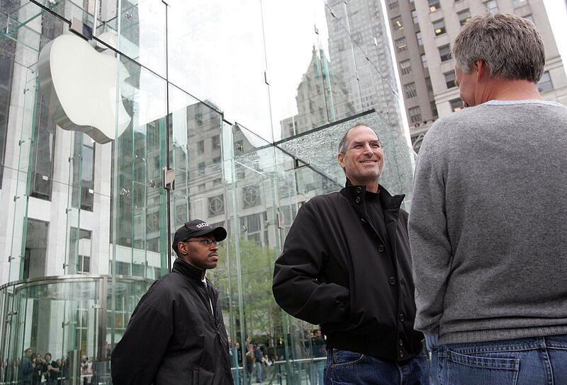 Apple Chief Executive Steve Jobs looks at the crowds at the grand opening of the new Apple Store on 5th Avenue in New York in this May 19, 2006, file photo. Apple Inc co-founder and former CEO Jobs, counted among the greatest American CEOs of his generation, died on October 5, 2011 at the age of 56, after a years-long and highly public battle with cancer and other health issues.    REUTERS/Seth Wenig   (UNITED STATES - Tags: OBITUARY SCIENCE TECHNOLOGY BUSINESS) *** Local Caption ***  SIN111_APPLE-JOBS_1006_11.JPG