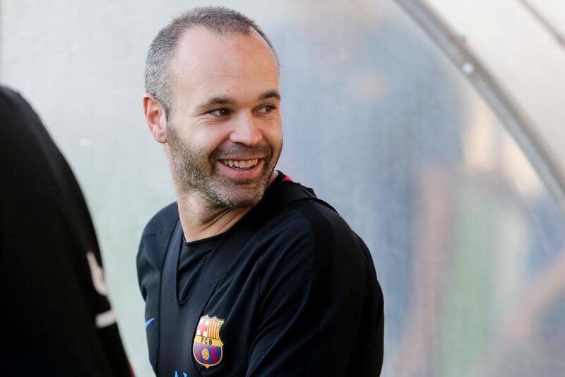 Barcelona captain Andres Iniesta arrives at the training session. Pau Barrena / AFP