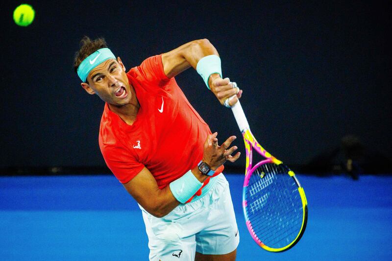 Rafael Nadal serves against Dominic Thiem. AFP