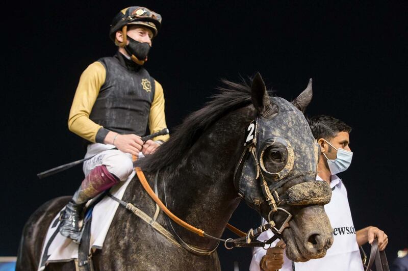 Nathan Crosse atop Twelfthofneverland is led into the paddock after winning the fifth race at Meydan on Saturday, January 30, 2021. Courtesy Erika Rasmussen/Dubai Racing Club