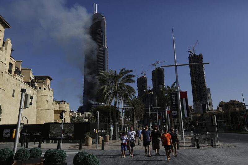 When fire broke out at The Address in Downtown Dubai on New Year’s Eve, the whole world could see the professional and efficient way in which the authorities and ordinary people dealt with the disaster. Sunday Alamba / AP Photo