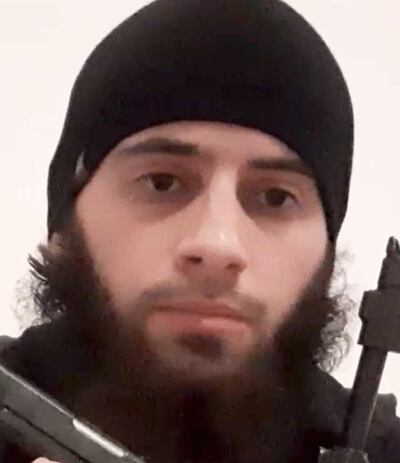 A man, identified by Islamic State, Amaq news agency as "Abu Dagnah Al-Albany," saying he attacked crowds in central Vienna on Monday with a gun and a machine gun, is seen in an undisclosed location, in this still image from a video obtained on November 3, 2020. AMAQ via Telegram/Reuters TV/via REUTERS THIS IMAGE HAS BEEN SUPPLIED BY A THIRD PARTY. REUTERS IS UNABLE TO INDEPENDENTLY VERIFY THIS IMAGE.