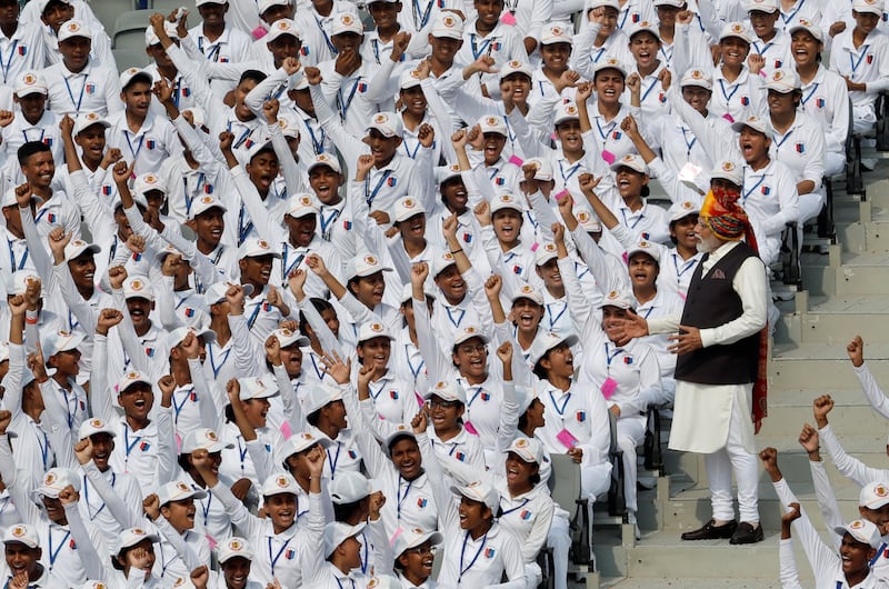 Prime Minister Narendra Modi meets National Cadet Corps after addressing the nation at the Red Fort in Delhi. Reuters
