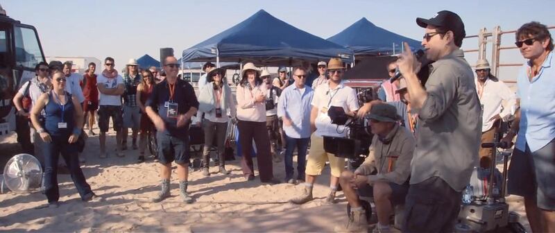 Handouts stills from a 4-minute clip from Star Wars: The Force Awakens that J.J. Abrams showed at Comic Con San Diego that highlight the filming in Abu Dhabi last year. Received July 2015. CAPTION 4: JJ Abrams addresses the crew in the Abu Dhabi desert on day one of the shoot. The Goosebumps are tangible as this seminal new movie finally starts to roll.
CREDIT: Courtesy Lucasfilm *** Local Caption ***  al3jl-Star Wars-4-WEB.jpg