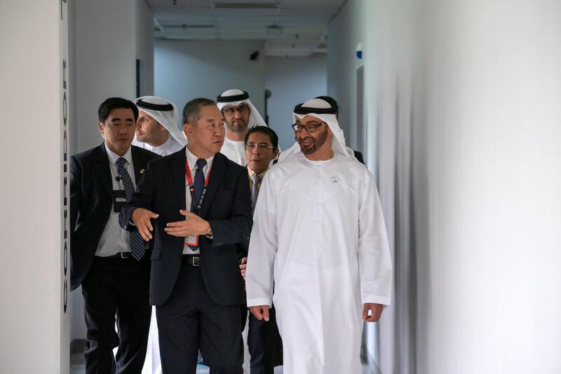 SINGAPORE, SINGAPORE - February 28, 2019: HH Sheikh Mohamed bin Zayed Al Nahyan, Crown Prince of Abu Dhabi and Deputy Supreme Commander of the UAE Armed Forces (R) tours Mubadala's GLOBALFOUNDRIES semiconductor facility. Seen with  Kay Chai Ang, Senior Vice President and General Manager for GlobalFoundries Asia and Europe Operations (2nd R).
( Ryan Carter for the Ministry of Presidential Affairs )
---