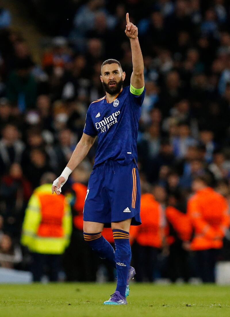 Karim Benzema celebrates scoring their first goal. Reuters