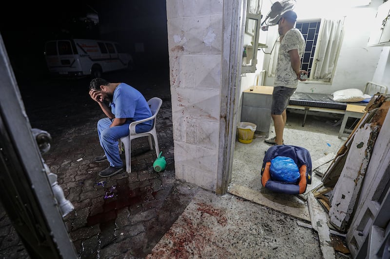 A doctor assesses the situation at Al Ahli Arab Hospital after yet another air strike in Gaza city. EPA