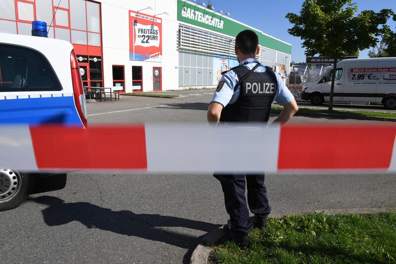 A policeman guards in front  of a discotheque in Constance, at Lake Constance,  Germany. Felix Kaestle / dpa via AP