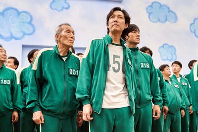 Lee Jung-jae, centre, Park Hae-soo, right, and O Yeong-su in a scene from the series 'Squid Game.' Photo: Netflix 