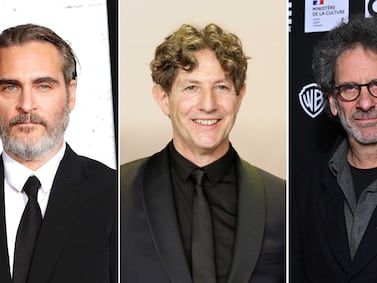 Oscar winners Joaquin Phoenix, left, and Joel Coen, right, are publicly backing Jonathan Glazer after his speech 'refuting his Jewishness' following the war in Gaza. EPA; Getty Images