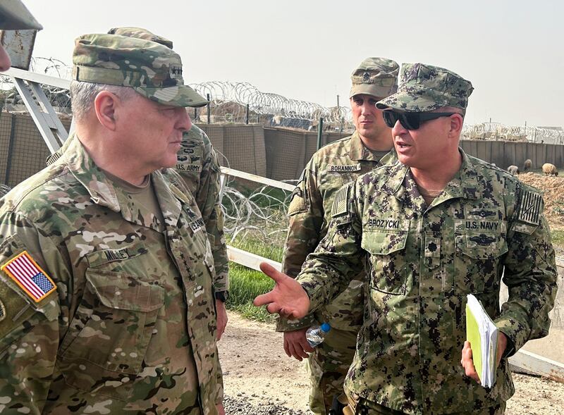 Gen Mark Milley, chairman of the US Joint Chiefs of Staff, receives a briefing at a military base in north-east Syria. Reuters