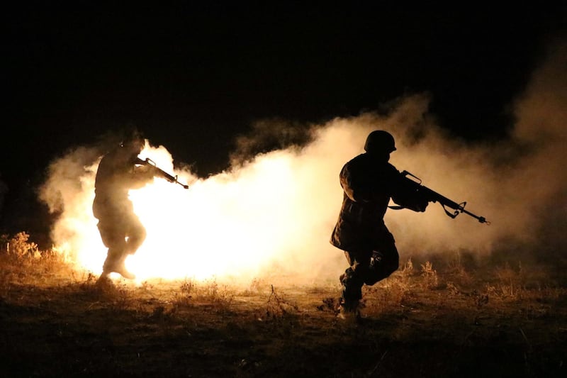 epa08822860 Afghan army soldiers (ANA) participate in a counter-terrorism night operations training in Herat province, Afghanistan, 15 November 2020. Training was conducted to sharpen skills for night operations.  EPA/JALIL REZAYEE