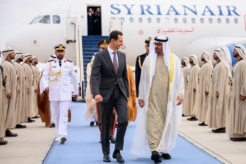 President Sheikh Mohamed receives Syrian President Bashar Al Assad at the Presidential Airport. Presidential Court